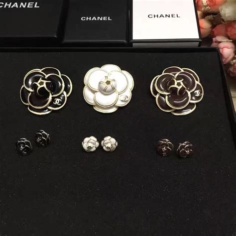 how to wear chanel camellia brooch|chanel camellia hoop earrings.